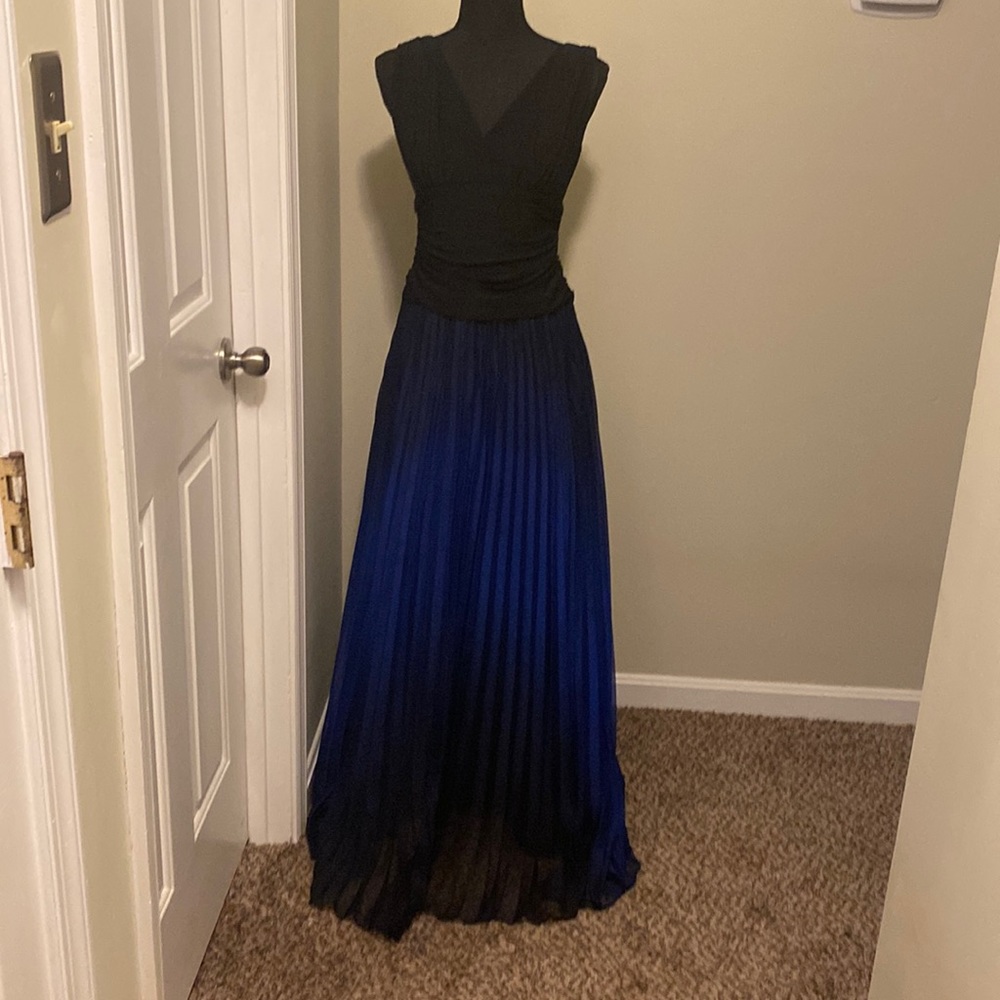 Formal gown, floor length, semi stretchy at the top